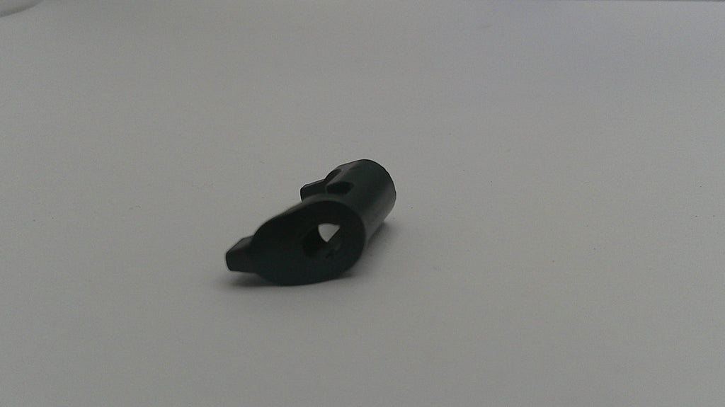 Black plastic component on a white background
