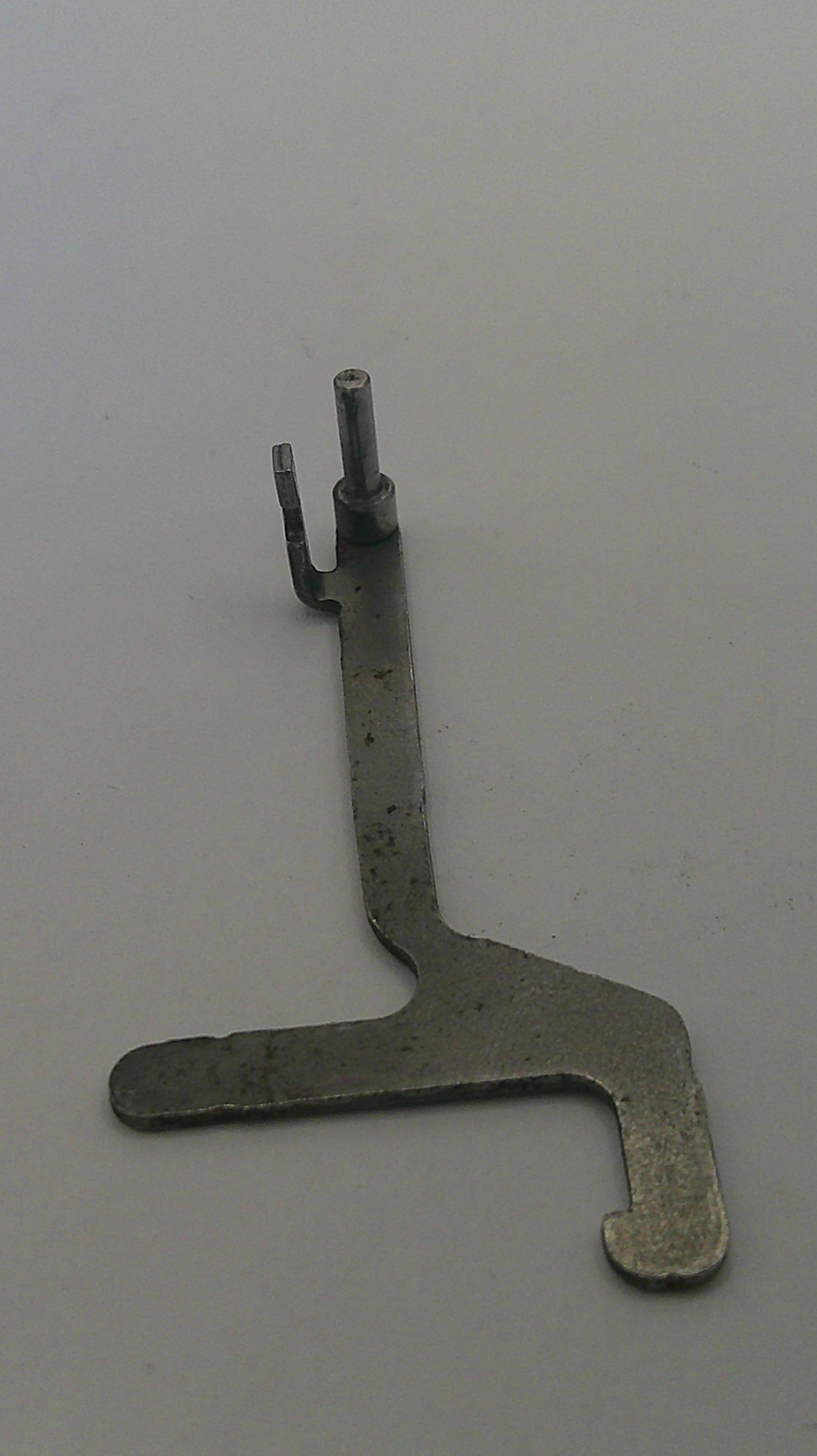 Metal tool on a gray background