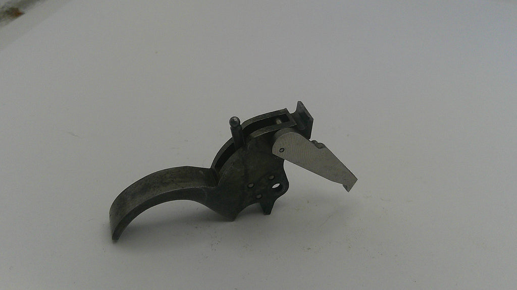 Metallic object with a blade on a white background