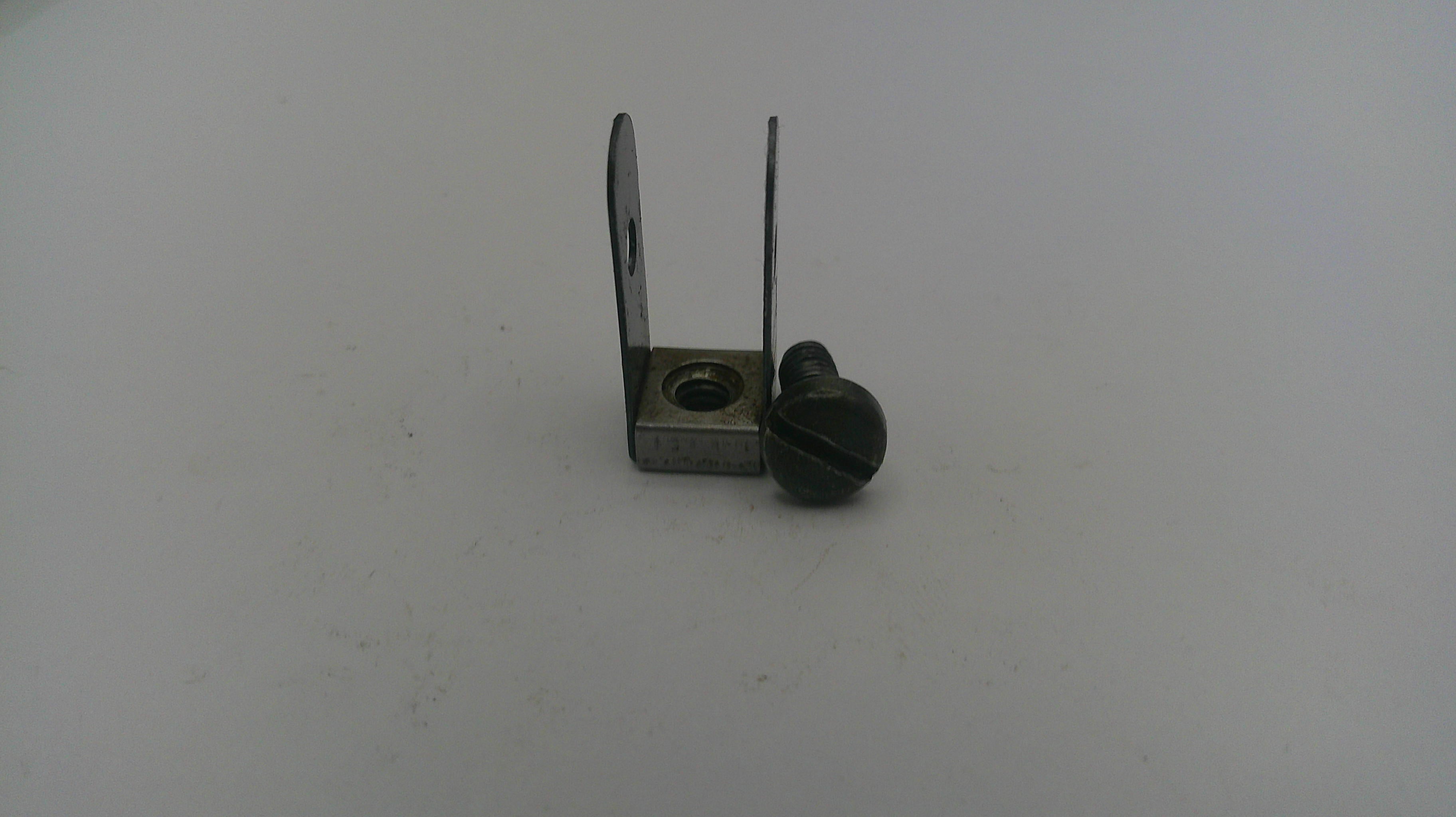 Small metal component on a white background