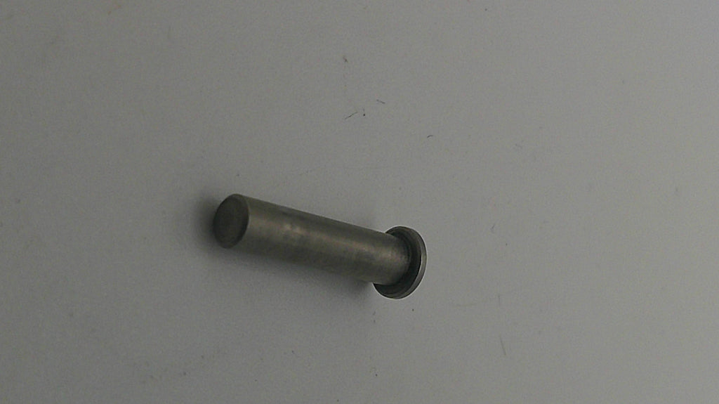 Metal cylindrical object on a plain background