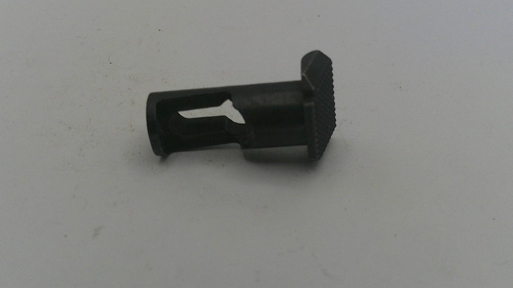 Black plastic component on a white background