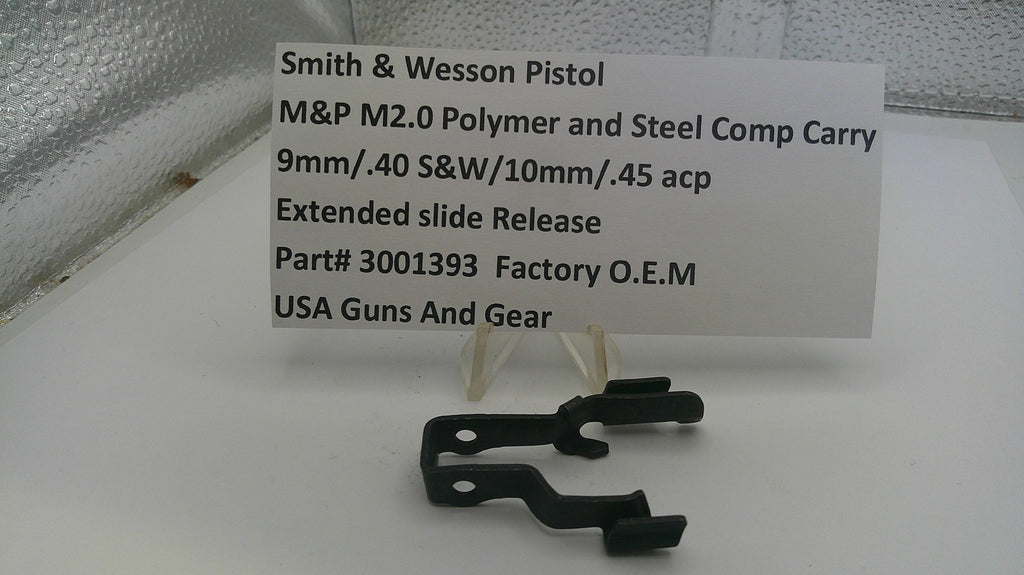 Smith & Wesson pistol part with a label on a white surface
