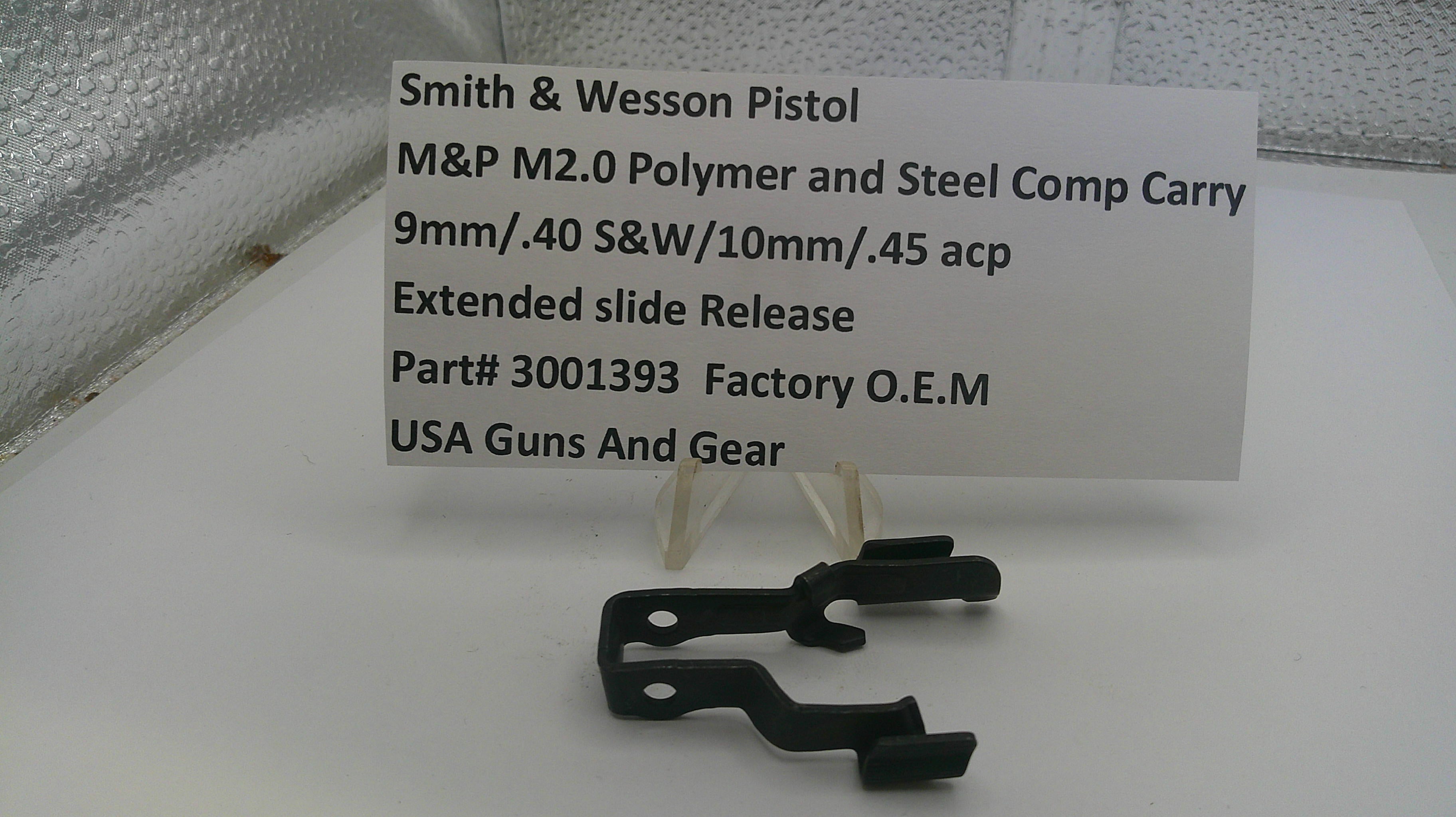 Smith & Wesson pistol part with a label on a white surface