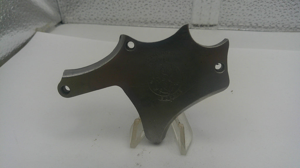 Black metal bracket on a stand against a white background