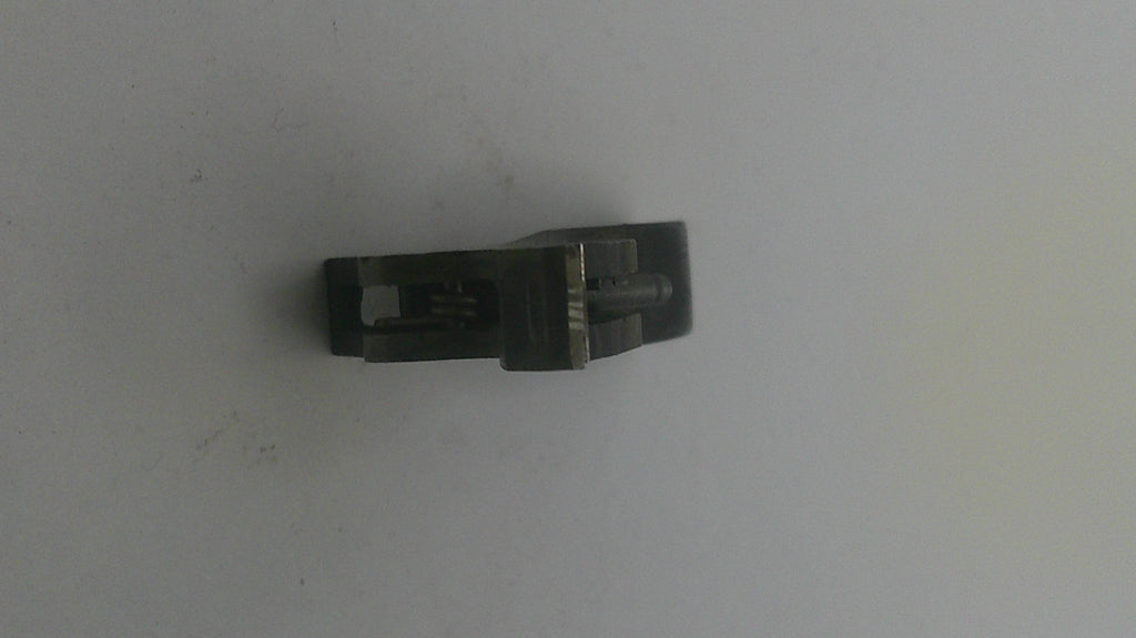 Metallic object on a light gray background