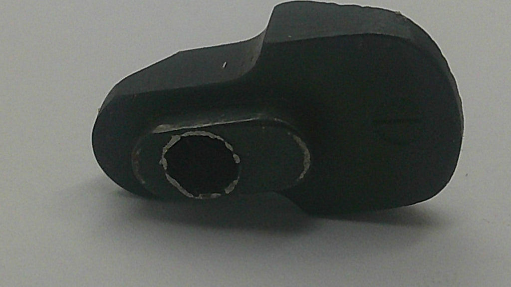 A black plastic mechanical component or adapter with a hexagonal opening, shown on a plain light gray background.