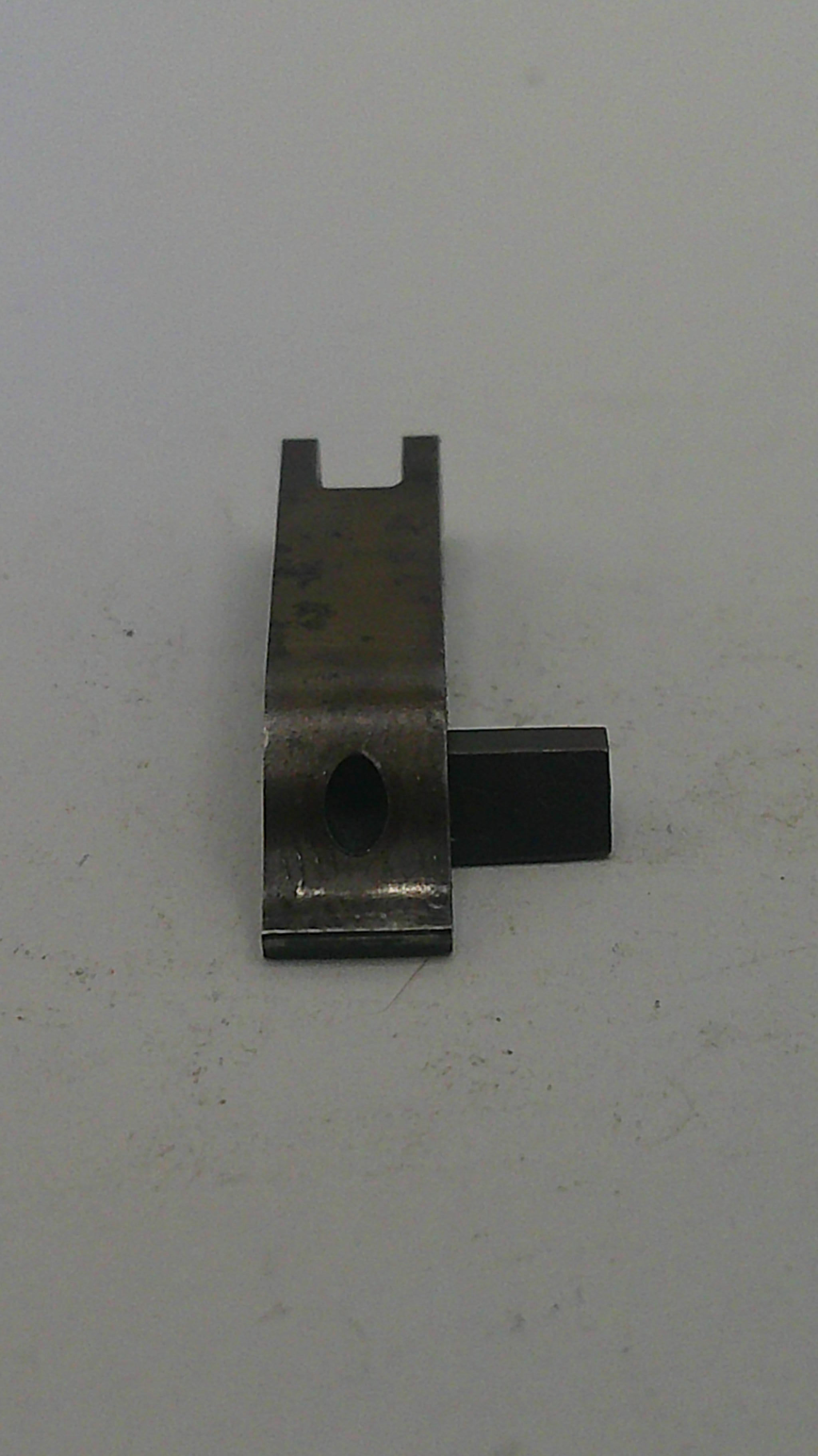 Metal component on a white background