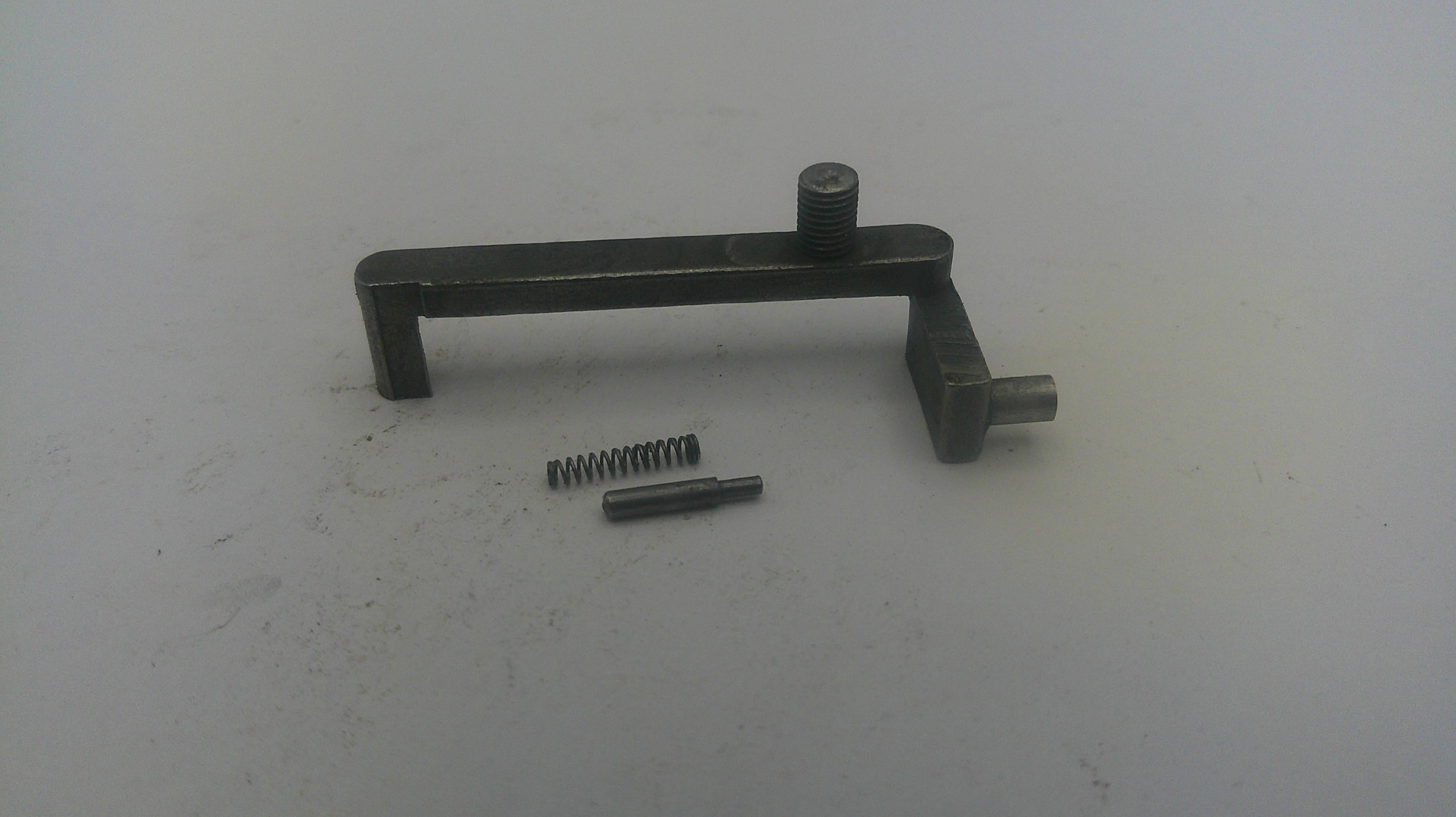 Metal lever and spring on a white background