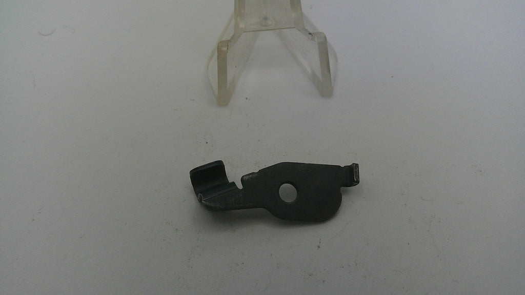 Black metal component on a white background