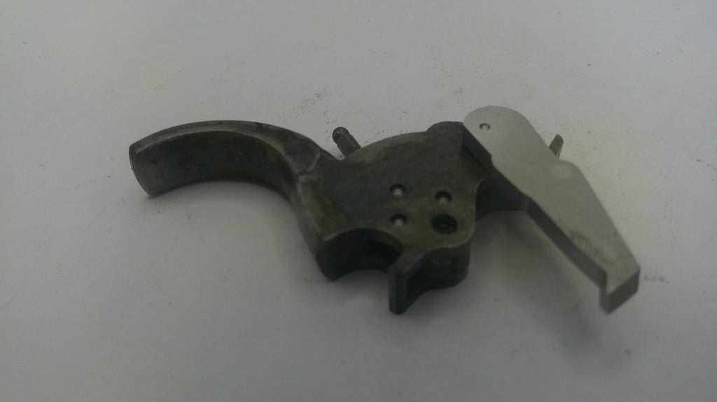 Metallic gun part on a white background