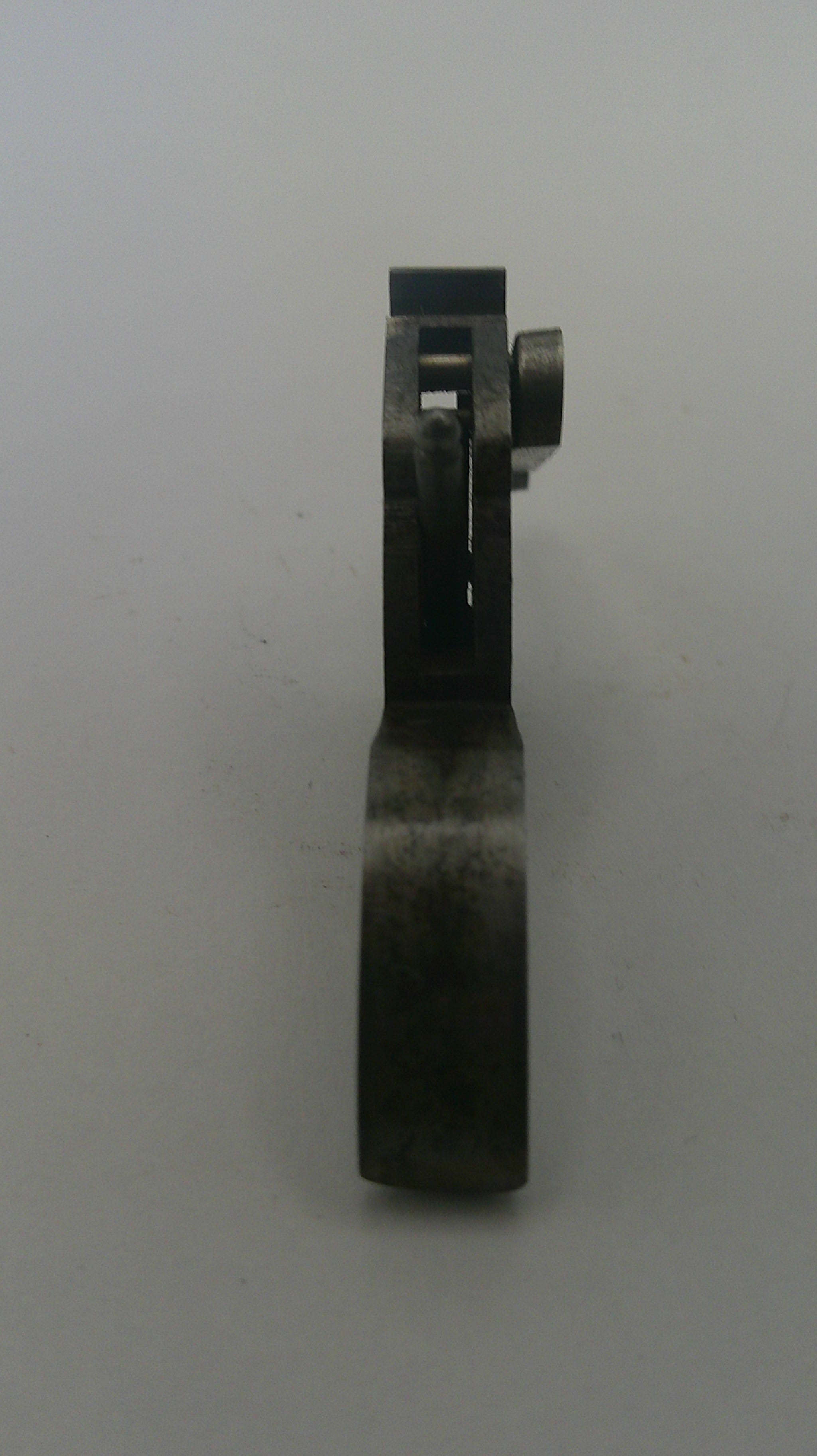 Metal component on a white background