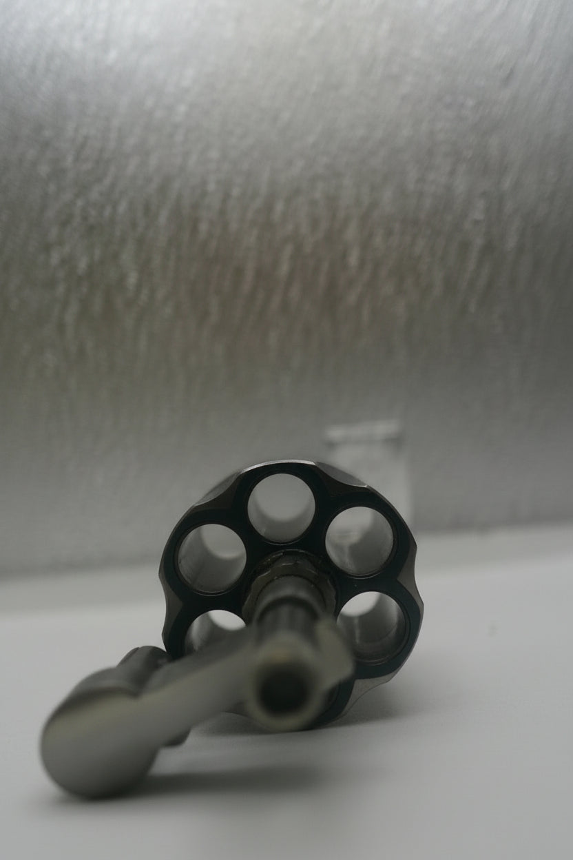 Close-up of a textured gray surface with a small label.