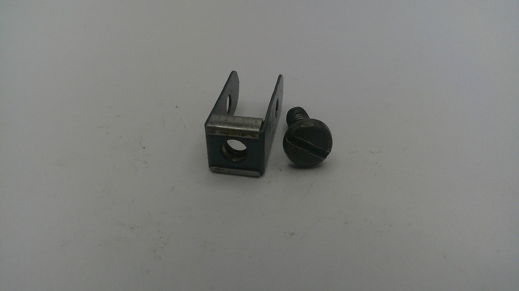 Small metal bracket and screw on a white background