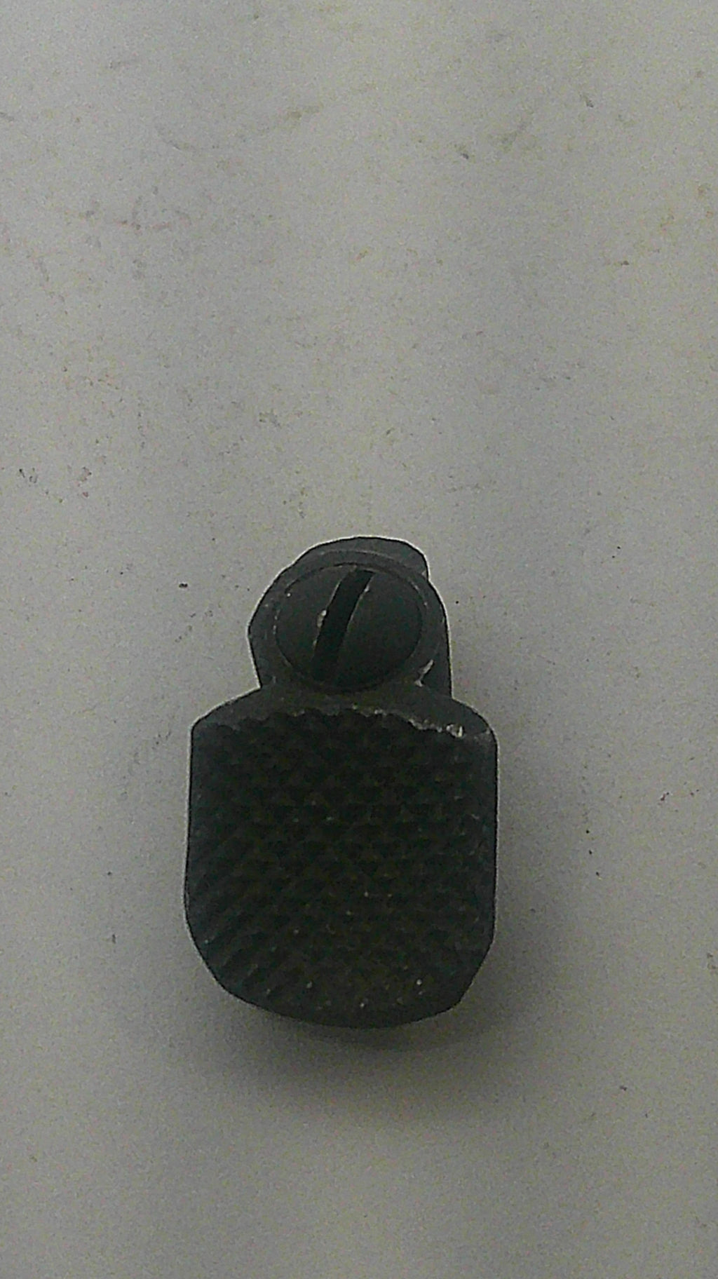 Smith & Wesson used blued thumb piece and nut, inventory reference K831, textured face view