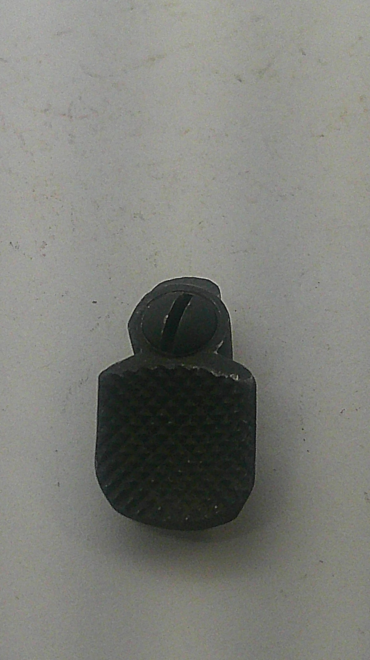 Smith & Wesson used blued thumb piece and nut, inventory reference K831, textured face view
