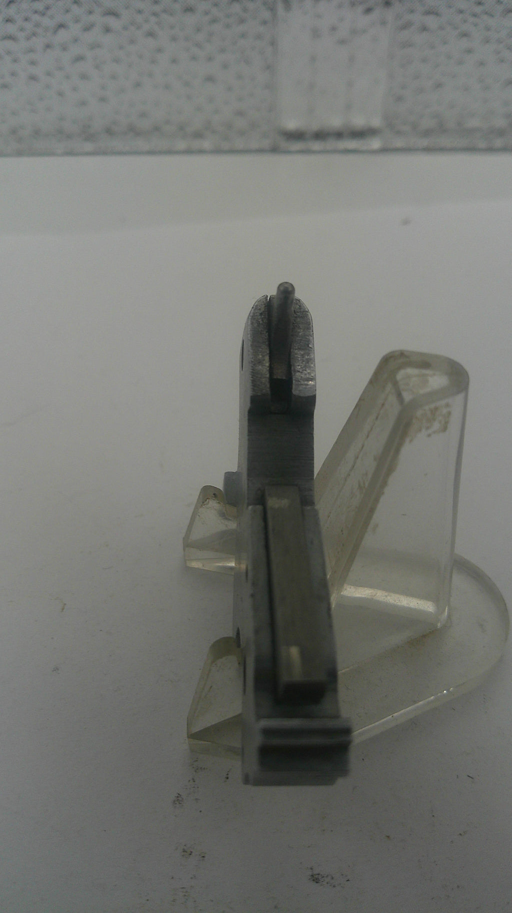 Clear plastic clip on a white background