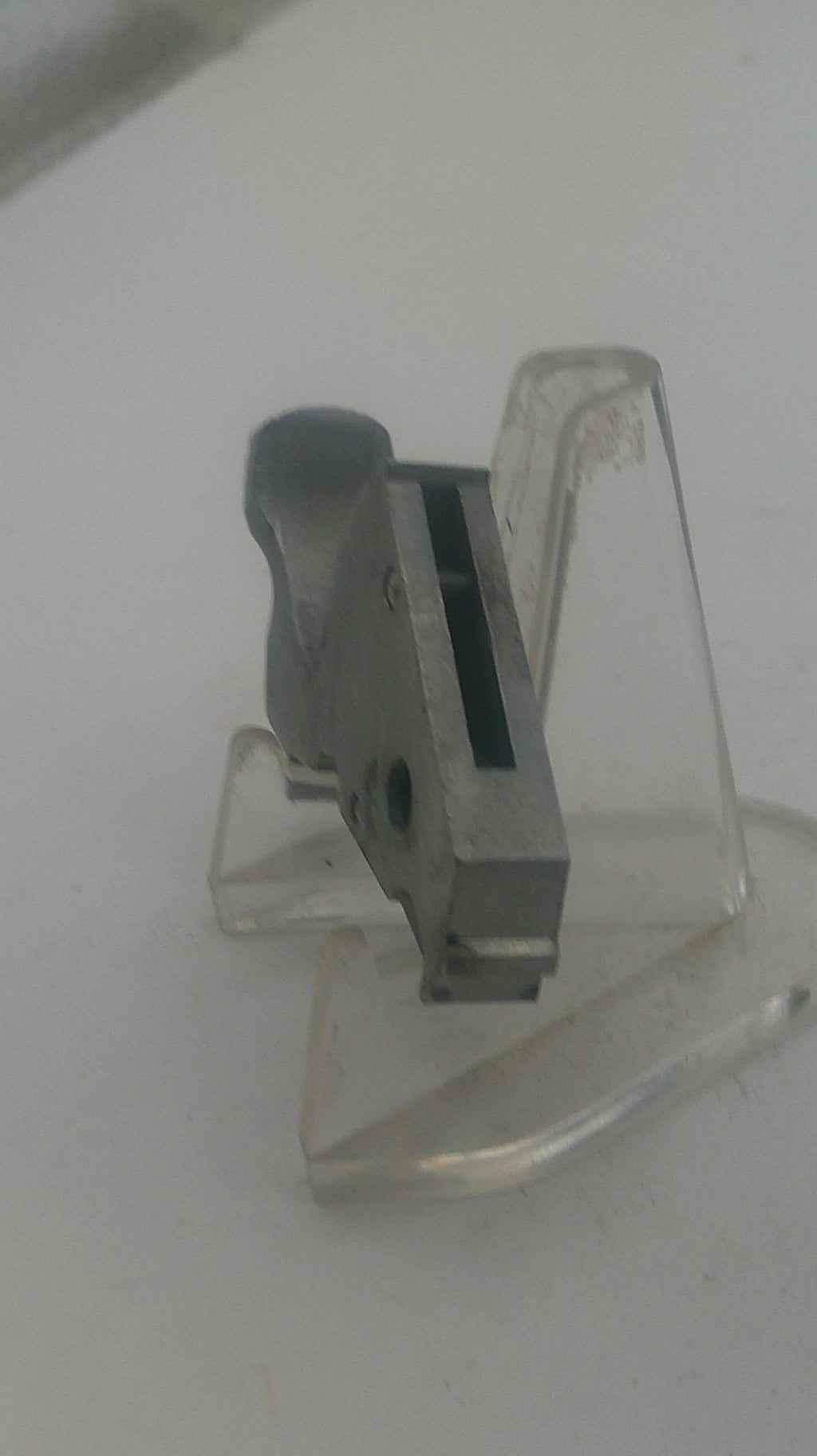 Record player stylus on a white background