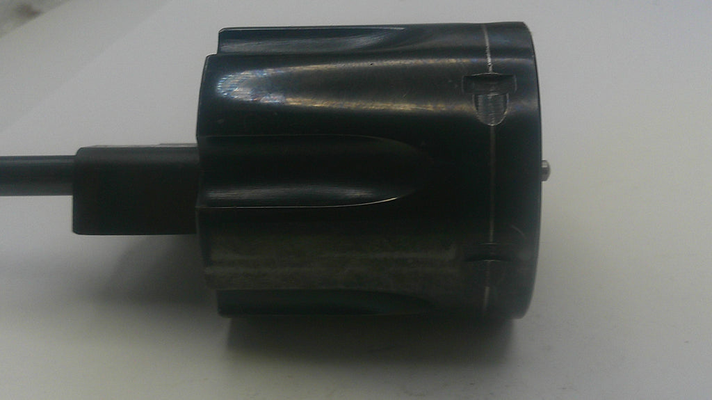Black cylindrical object with a cable on a white background