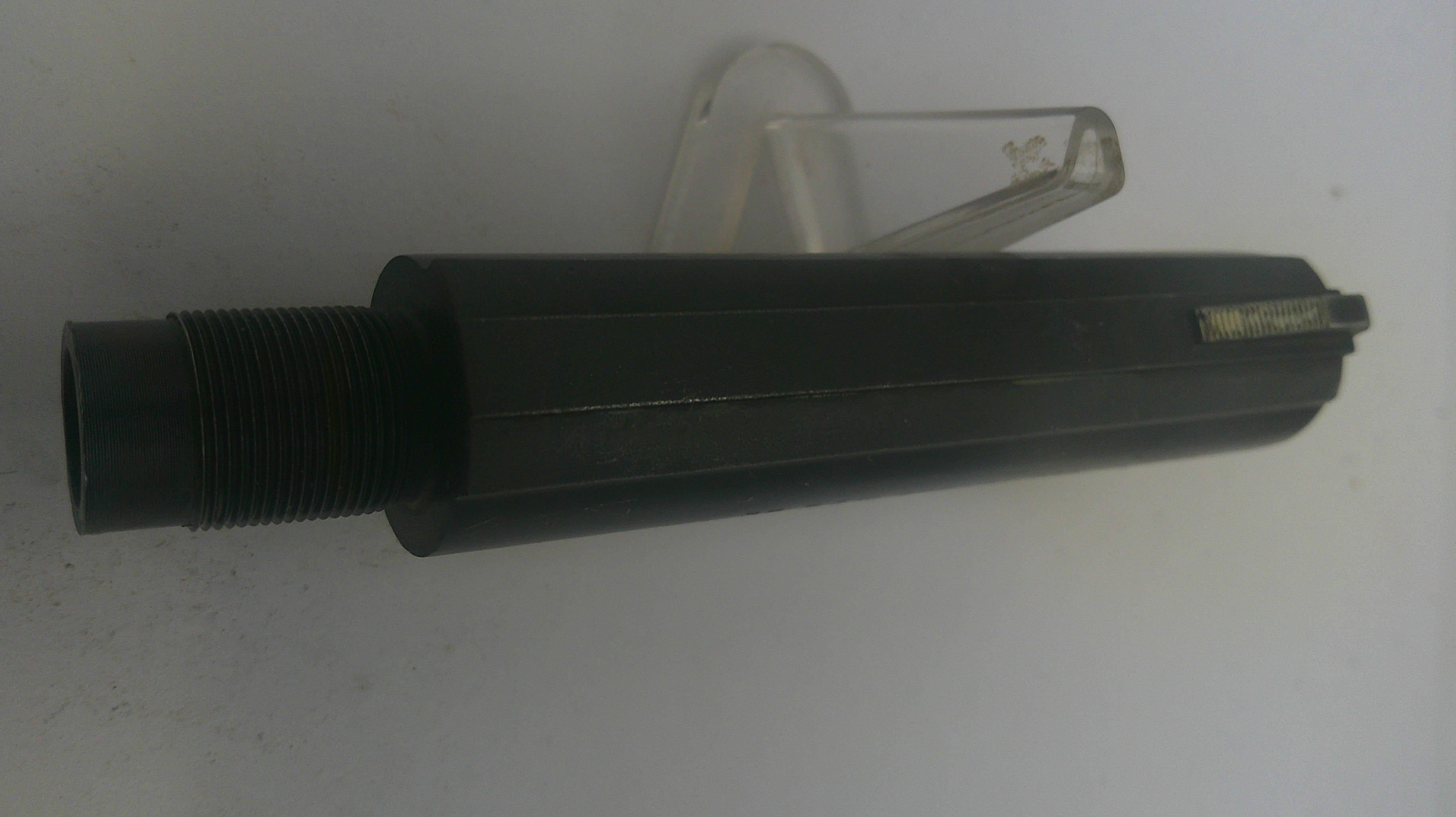 Black cylindrical object on a white background