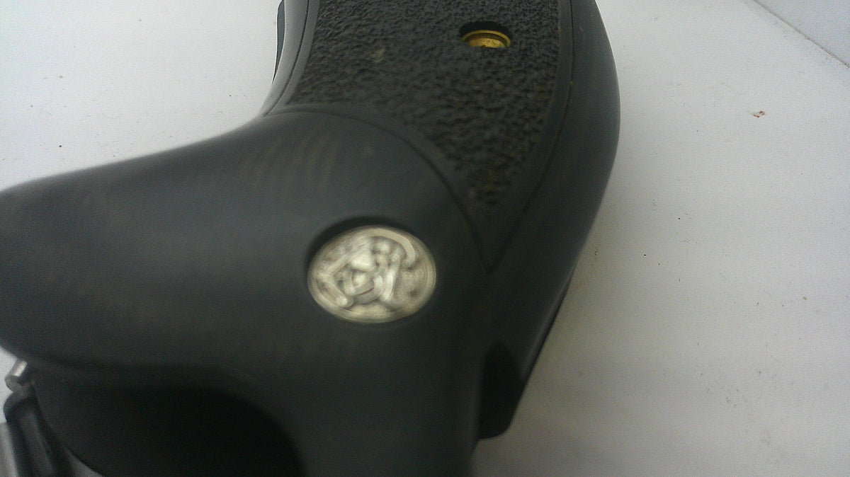 Smith & Wesson K/L Frame Round Butt Wood Grips, medallion close-up. Inventory reference AG1