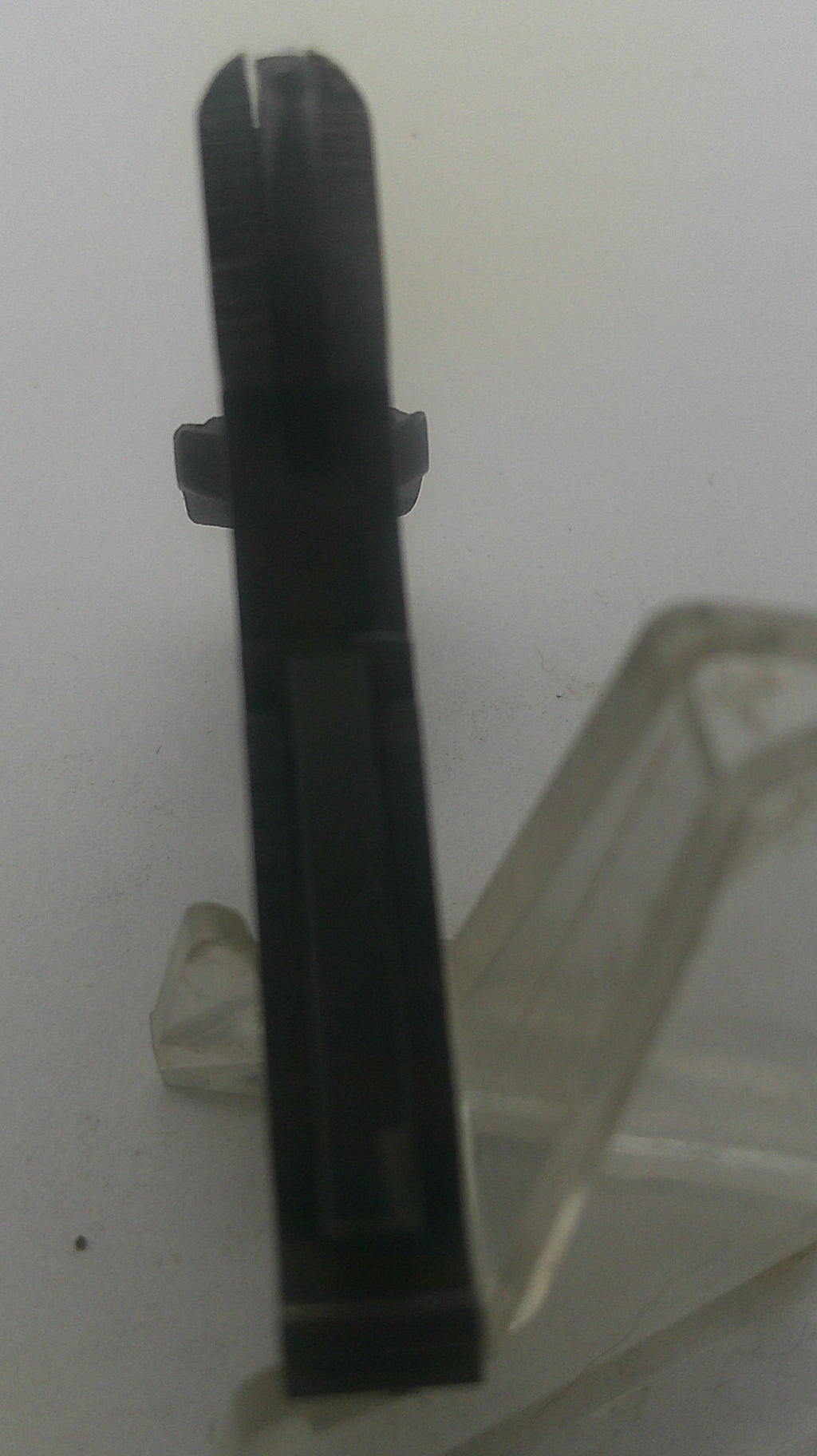 Black metal tool on a white background
