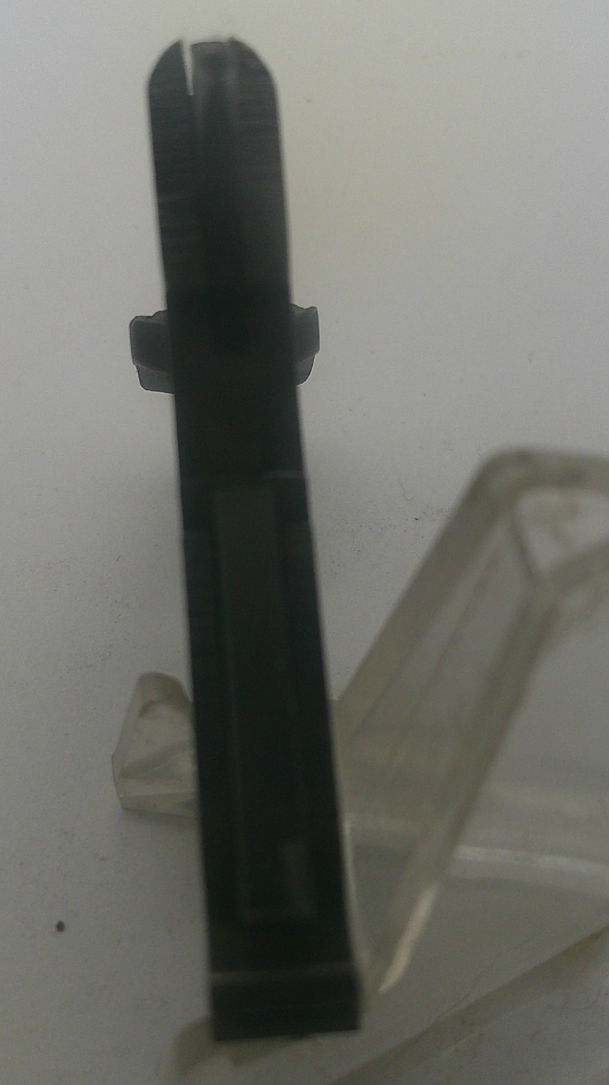 Black metal tool on a white background