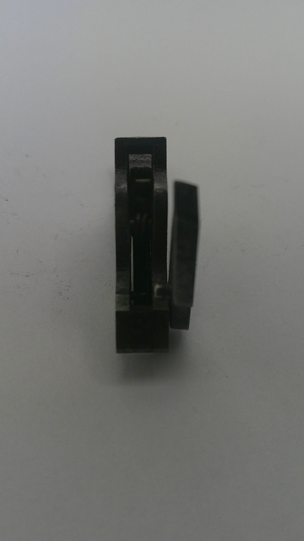 Black rectangular object on a white background