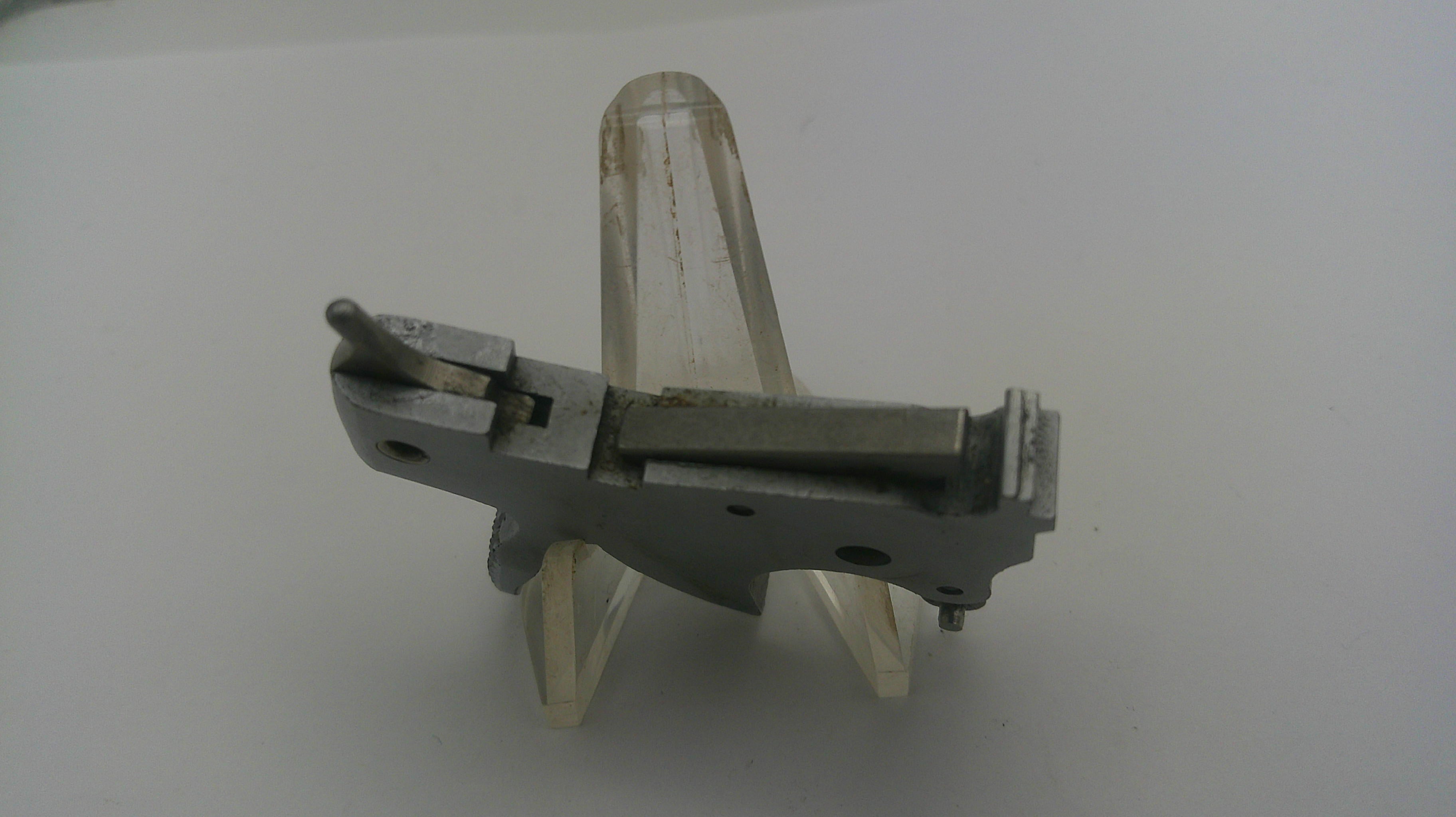 Metal mechanical component on a white background