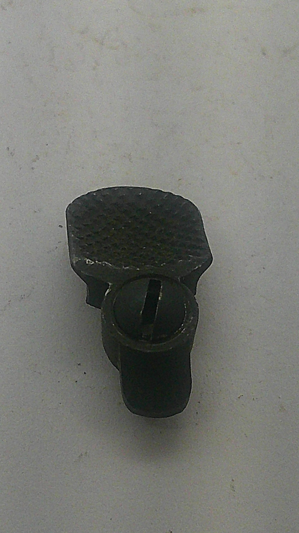 Smith & Wesson used blued thumb piece and nut, inventory reference K831, angled face view