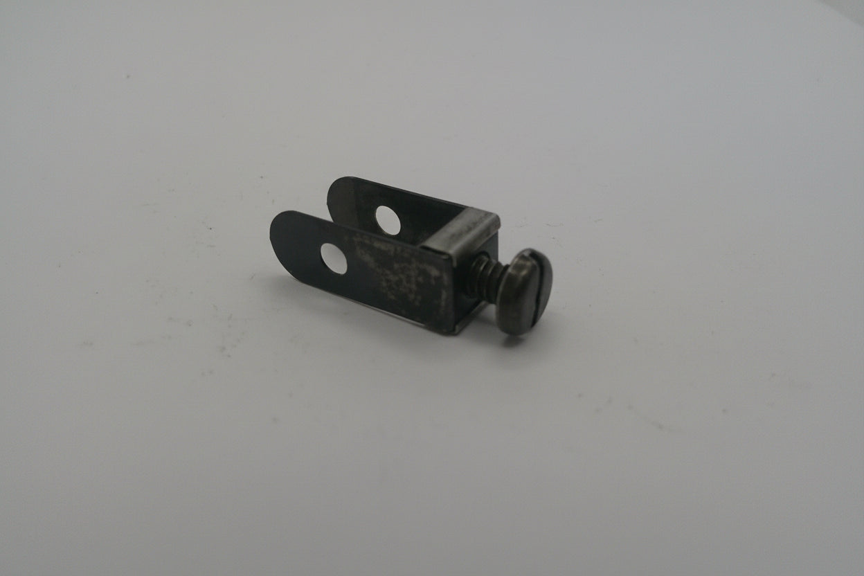 Small metal component on a white background