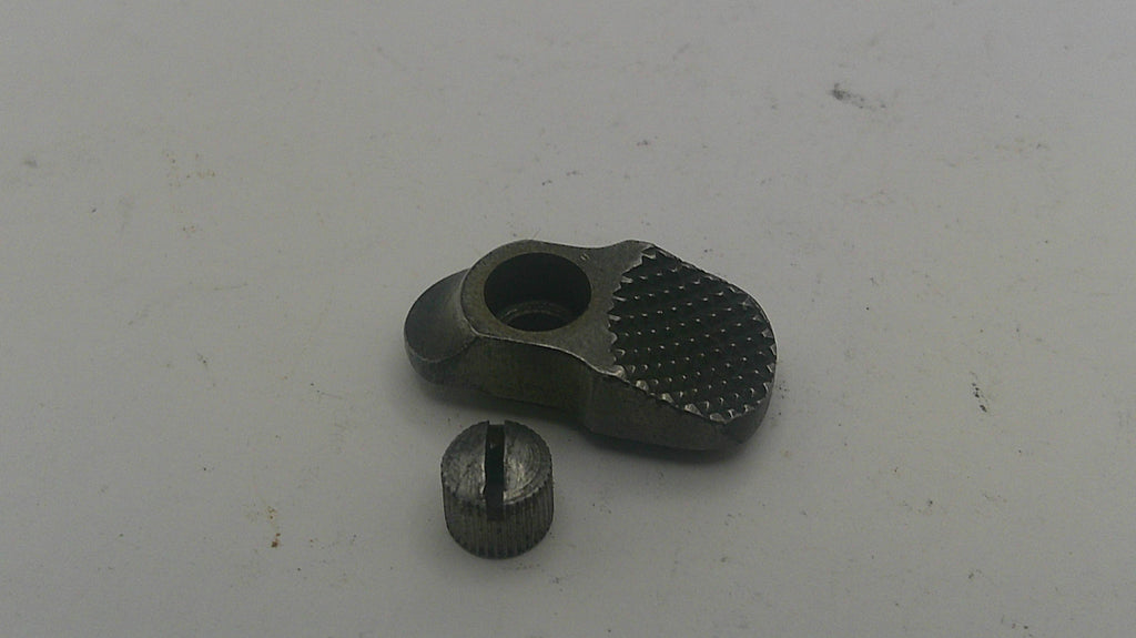 Two metallic objects on a light gray background