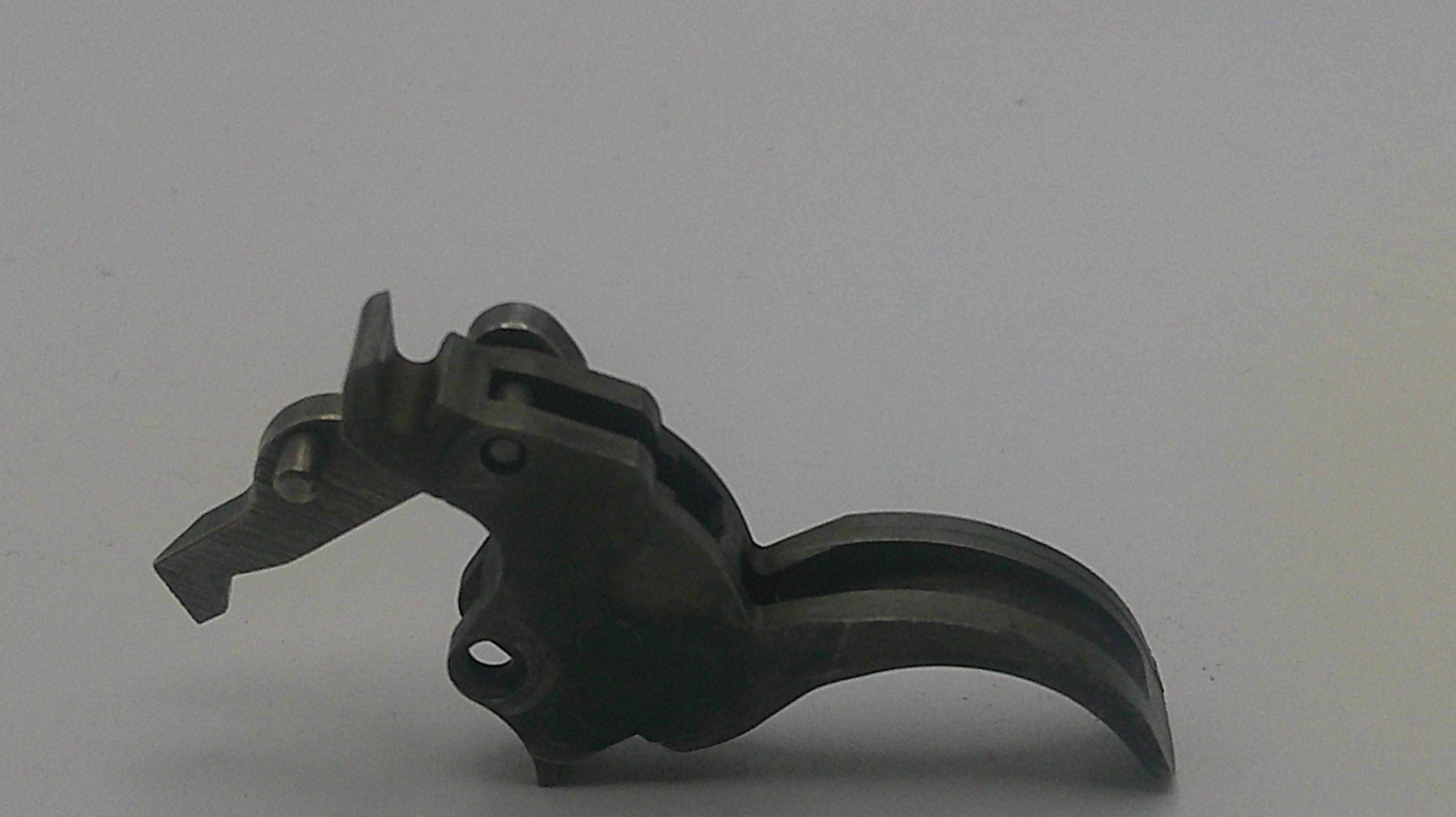 Metallic tool or component on a white background