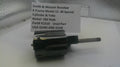 Smith & Wesson revolver part on a white surface with a label