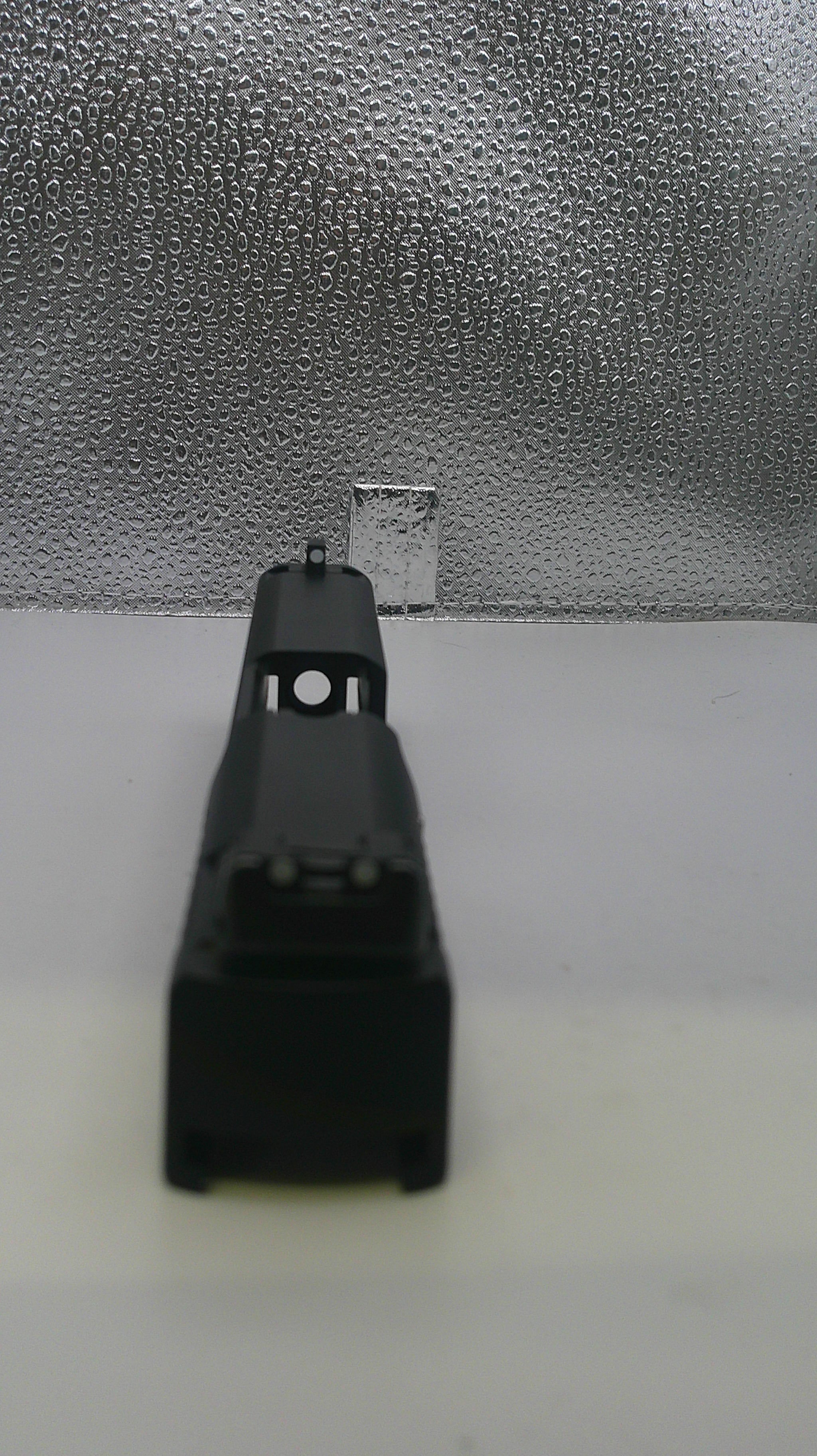 Black electronic device on a textured surface