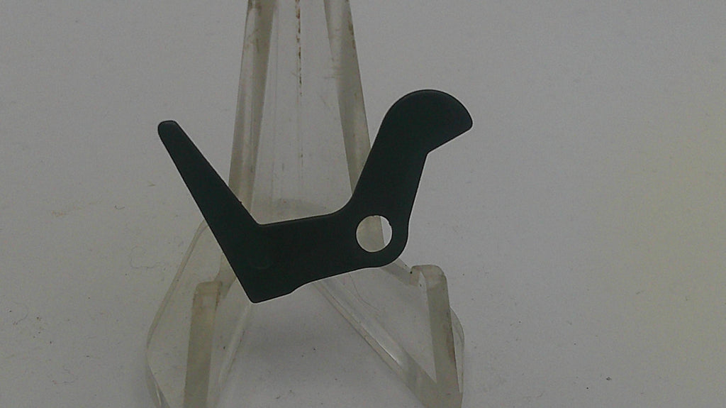 Black metal bracket on a white stand against a white background
