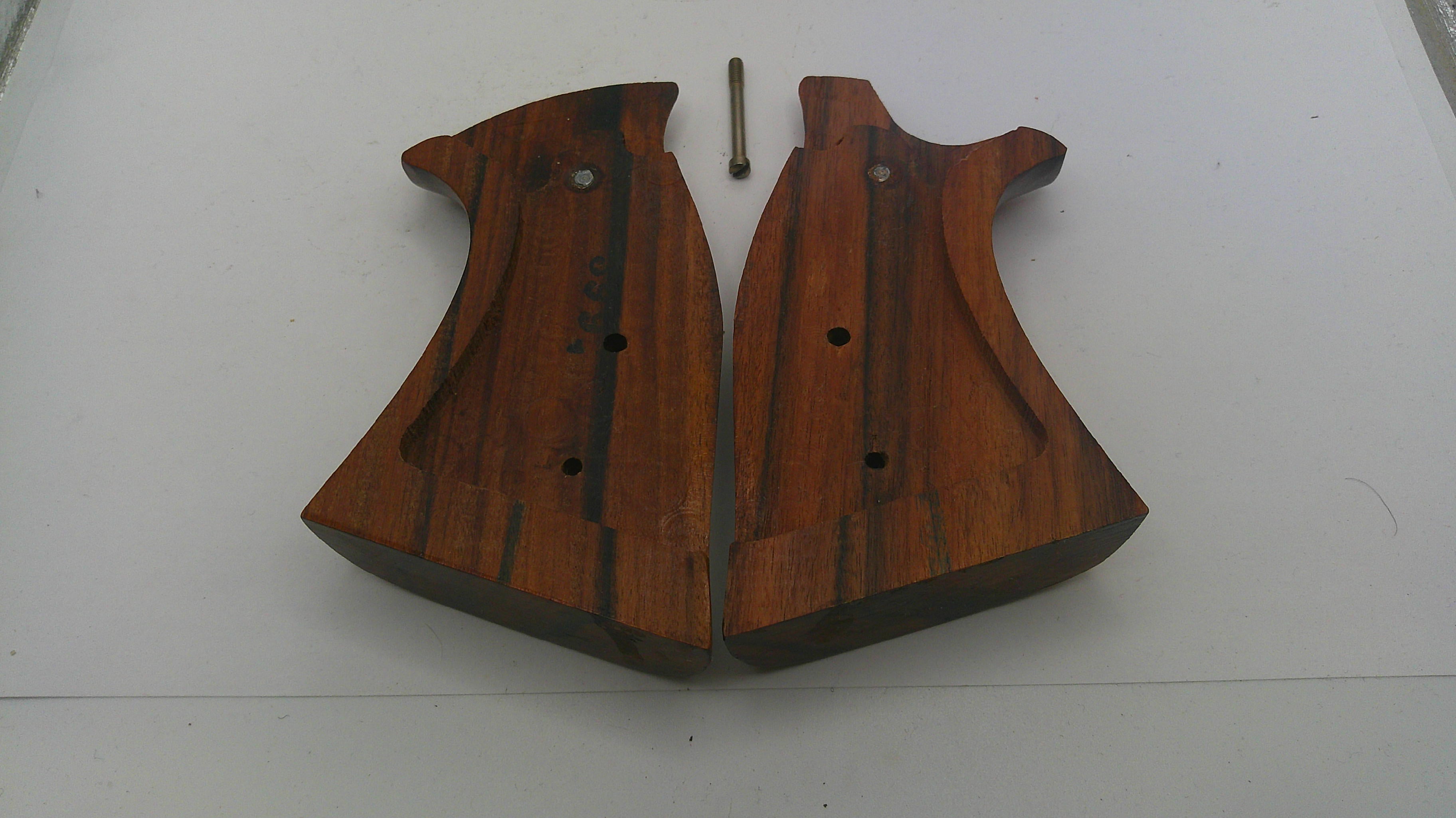 Wooden gun grips on a white background