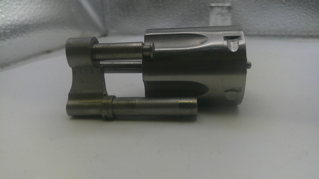 Metallic lock mechanism on a white surface