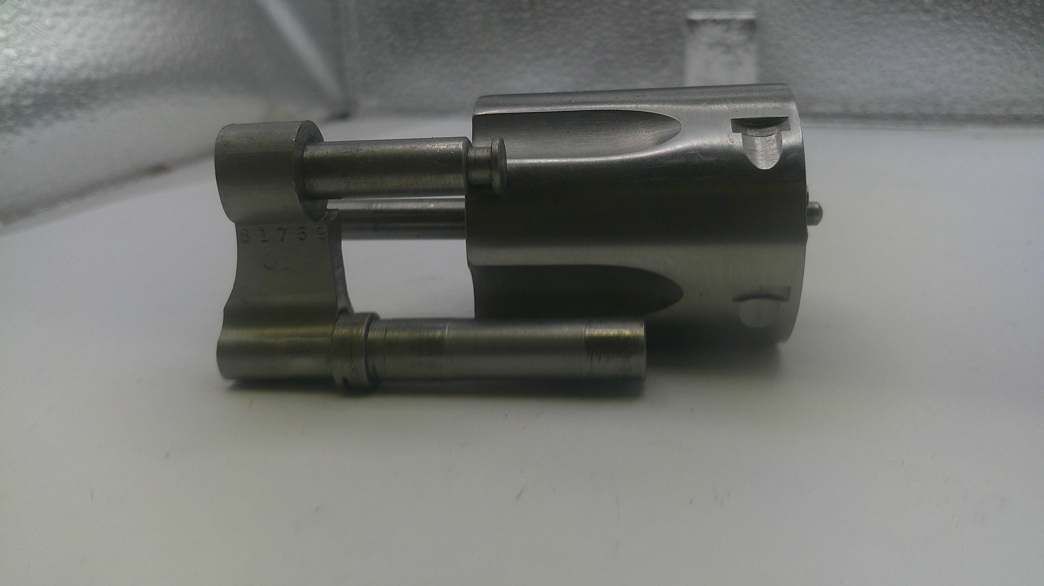 Metallic lock mechanism on a white surface