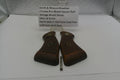 Smith & Wesson revolver grips and screw on a white surface with a label.
