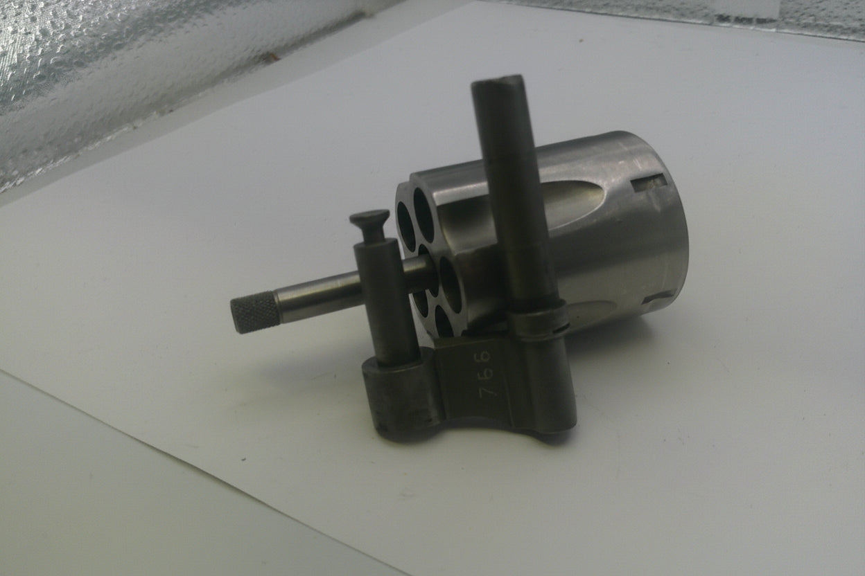Metal mechanical component on a white surface