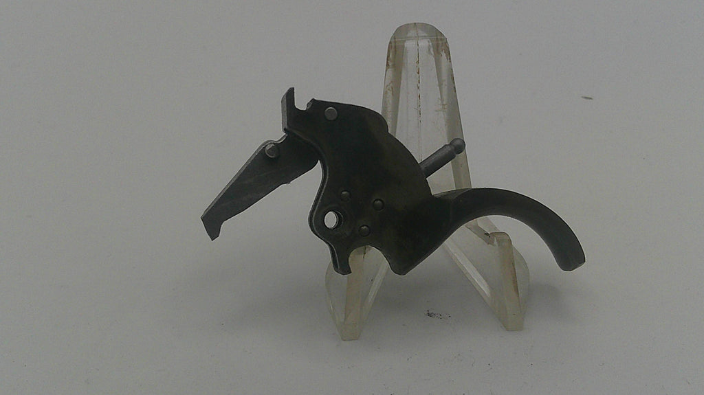 Black metal tool with clear plastic components on a gray background