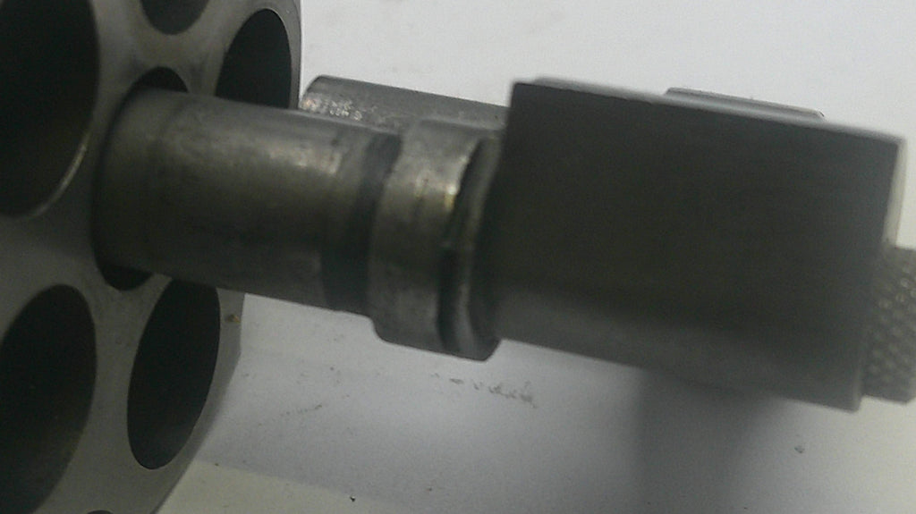 Metal fitting on a white background