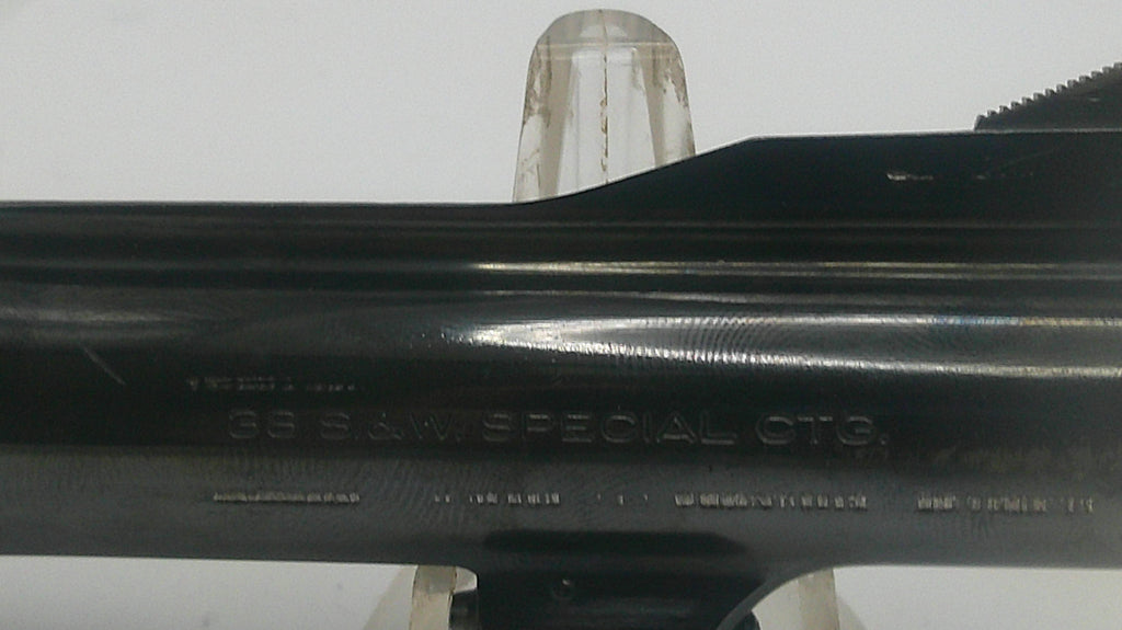 Black rifle barrel with 'SS & W Special OTB' engraving on a white background
