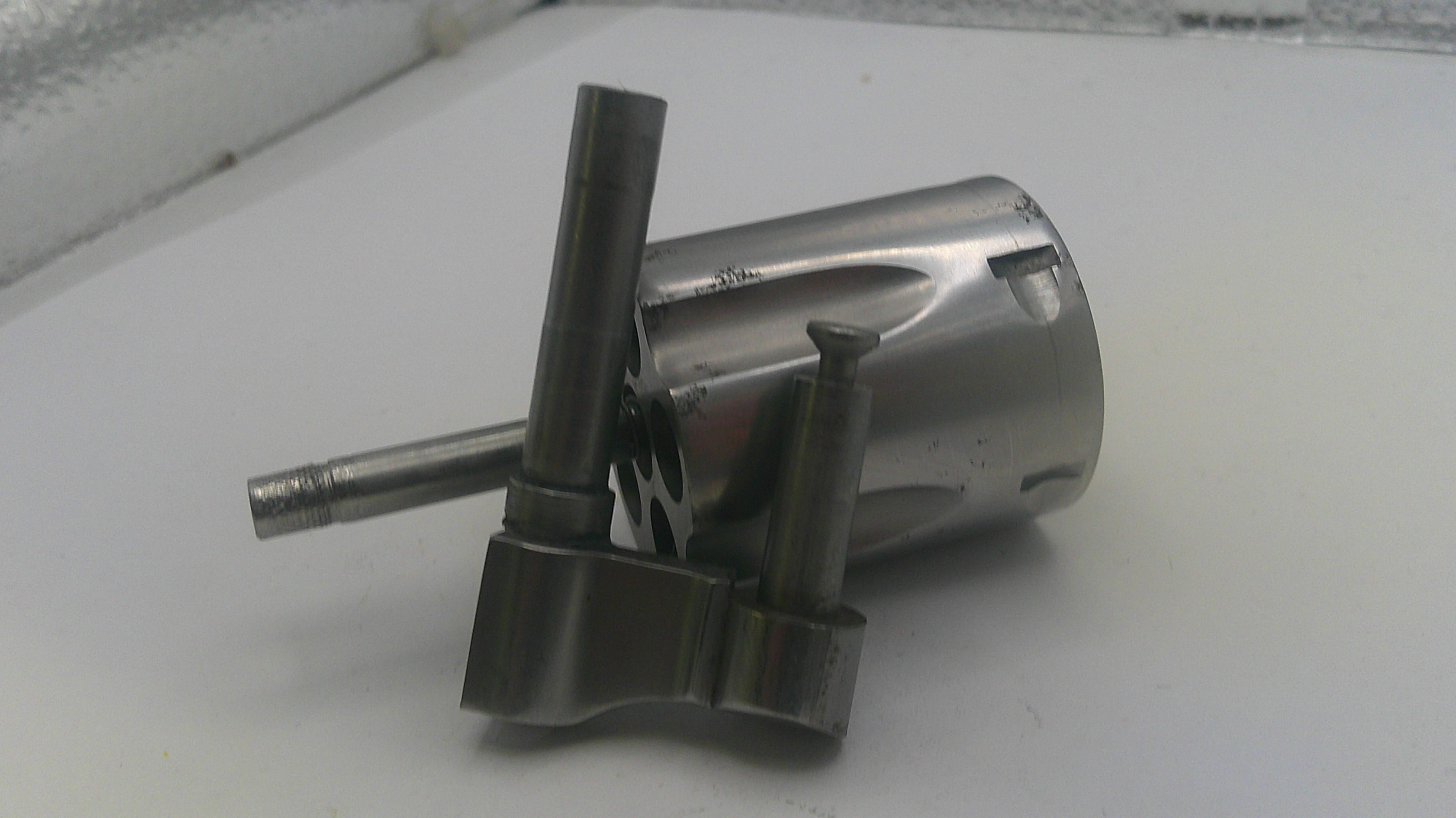 Metallic valve or component on a white background