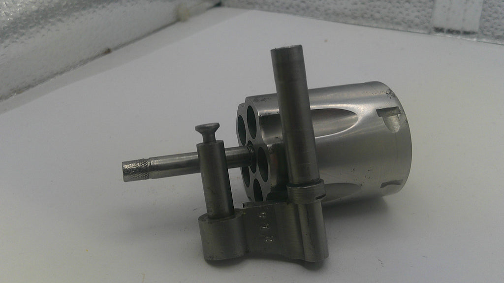 Metal mechanical component on a white surface