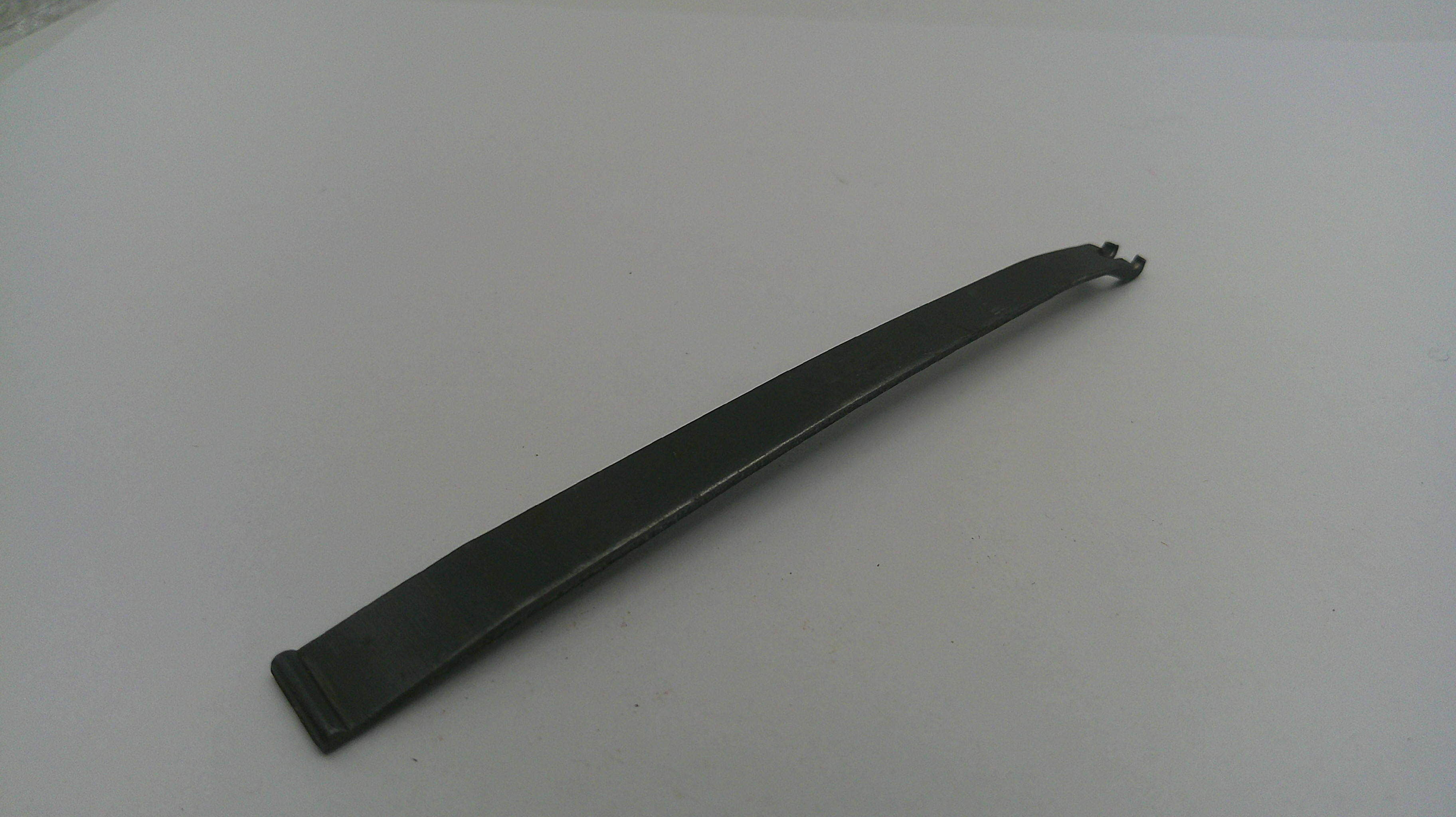 Black metal tool on a white background