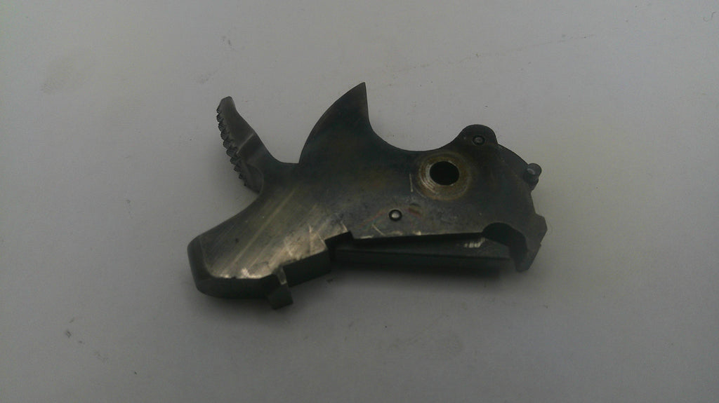 Metallic tool or component on a white background