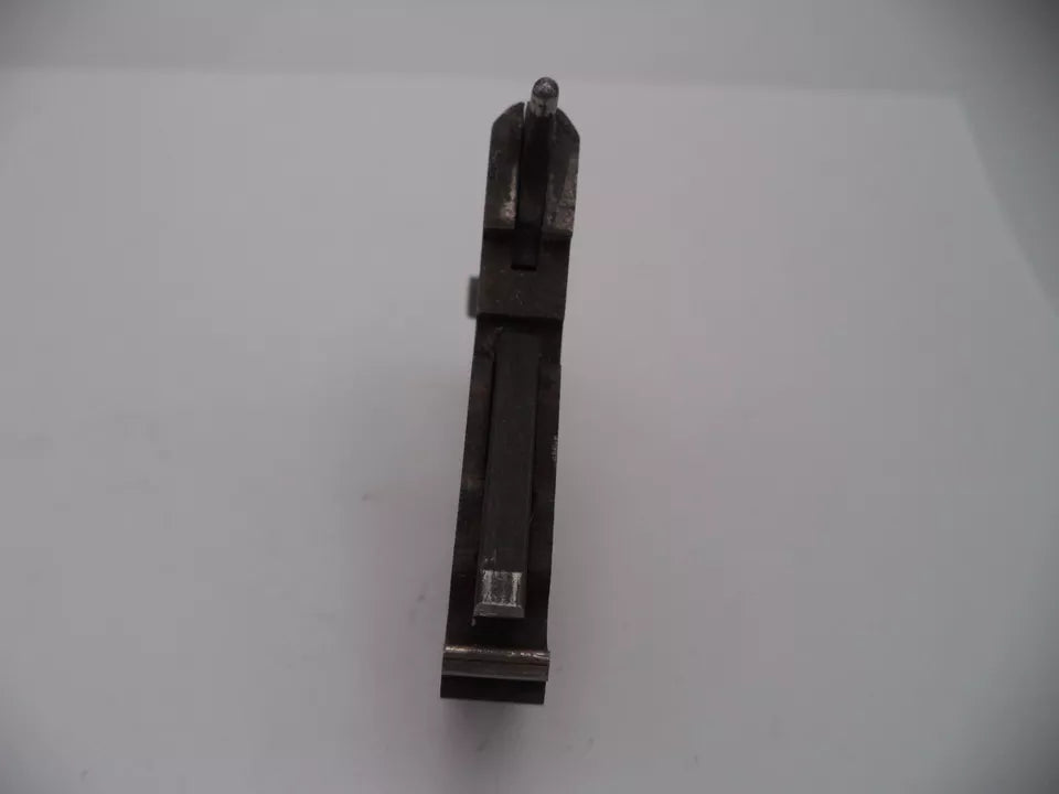 Metal component on a white background