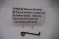 Smith & Wesson revolver K Frame Model 15 .38 Special hammer block on a white background with a label.